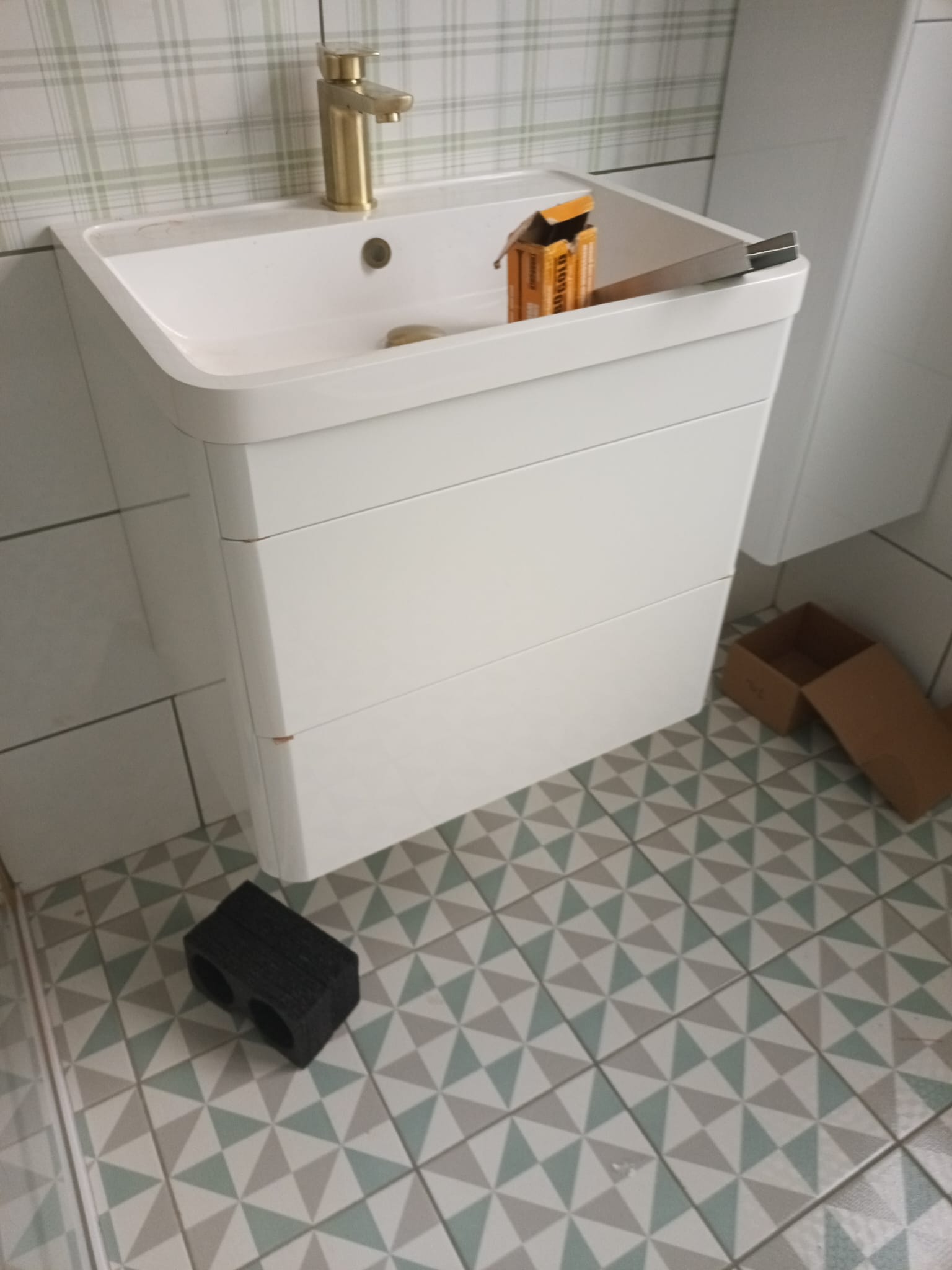 Wall-Hung Vanity with Geometric Tiles