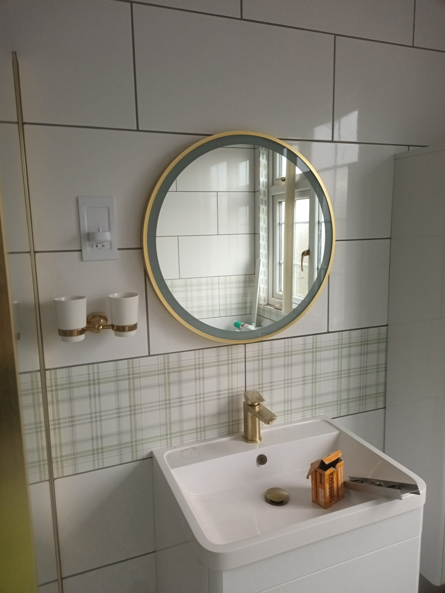 Round Gold-Framed Mirror